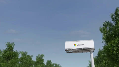 Driving towards advertising billboard with Microsoft logo. Editorial 3D Stock Footage 73839581