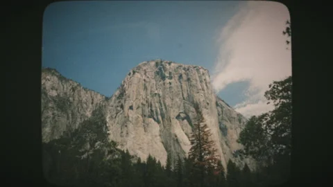 Driving towards El Capitan granite rocks in Yosemite National Park. Vintage F Stock Footage 136732226