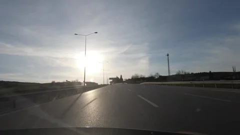 Driving towards the sun by car Video stock 150299295