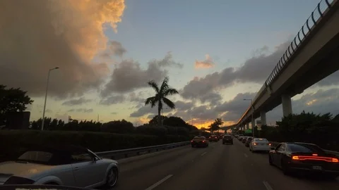 Driving towards the sunset on the highway Stock Footage 75328657