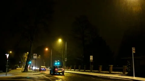 Driving town in the winter at night Stock Footage 10745758