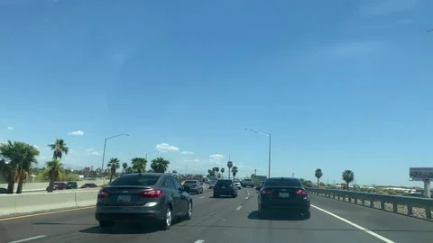 Driving in Traffic on freeway Stock Footage 164760096