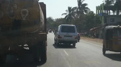 Driving in traffic in India Stock Footage 10800617