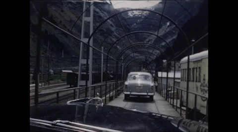 Driving onto Train in Automobile 1957 Stock Footage 48071703