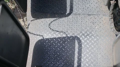 Driving train with close-up view of diamond plate texture on a vintage step b Video stock 294974059