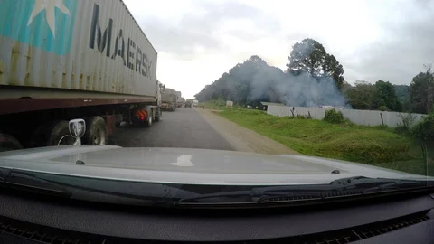 Driving with trucks and work vehicles in Africa Video stock 107181704