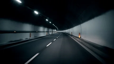 Driving in tunnel. Slow turn. Stock Footage 87050133