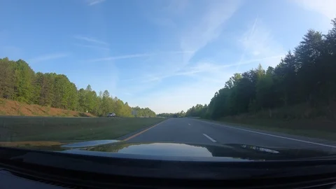 Driving in a two way road time lapse Stock Footage 106945310