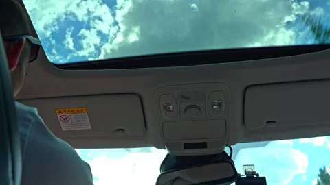 Driving Under Blue Sky Through Panoramic Sunroof During Road Trip Stock Footage 341766599