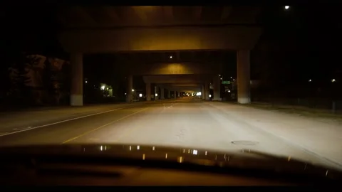 Driving Under Bridge at Night Stock Footage 138472421