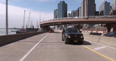 Driving under the Brooklyn Bridge along the FDR drive in Downtown Manhattan Stock Footage 51231582