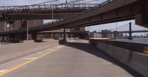 Driving under the Brooklyn Bridge and Manhattan Bridge along the FDR drive Stock Footage 51247416