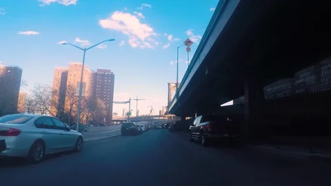 Driving Under the Brooklyn Bridge on mostly empty city streets during COVID-19 Stock Footage 129761208