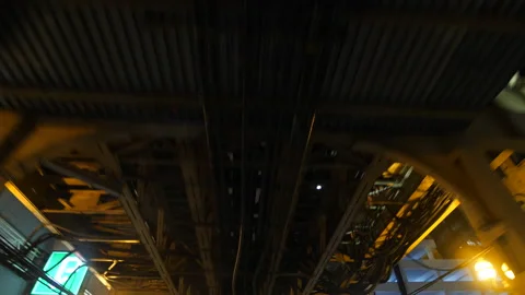 Driving Under Chicago El Train at Night. Stock Footage 166817329