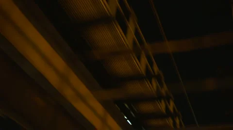 Driving under elevated city train tracks Stockbeeldmateriaal 6106040