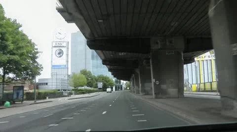 Driving under flyover M4 motorway into west London Stock-Footage 12400937
