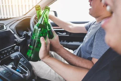 Driving under the influence get into accident, Two asian man drives a car wit Stock Photos