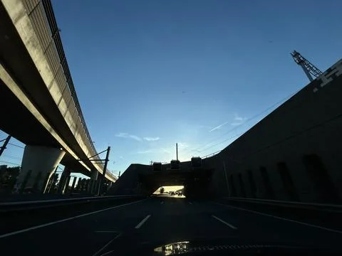 Driving Under Modern Bridge Infrastructure on the A10 Highway in Amsterdam Stock Photos