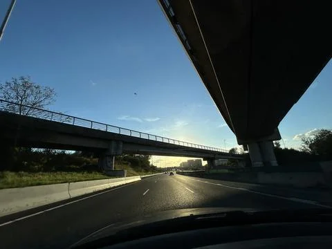 Driving Under Modern Bridge Infrastructure on the A10 Highway in Amsterdam Stock Photos