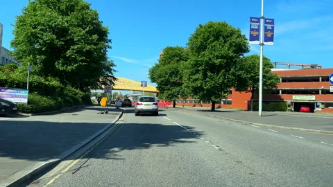 Driving under modern pedestrian bridge by Swansea Arena Vídeo Stock 277134591