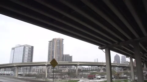 Driving Under Overpass in Dallas, Texas filmed in Super Slow Motion Stock Footage 54764101