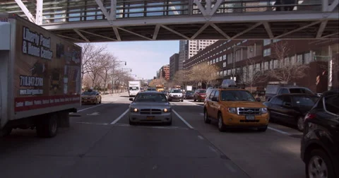 Driving under a pedestrian bridge over the West Side Highway in Manhattan Stock Footage 51229527