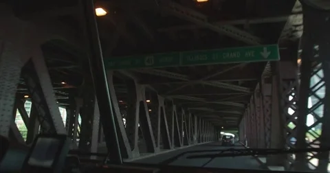 Driving under a red bridge Stock Footage 79832473