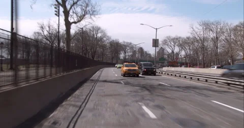 Driving under the Williamsburg Bridge along the FDR Drive in downtown Manhattan Stock Footage 51232305