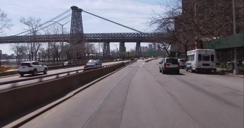 Driving under the Williamsburg Bridge along the FDR Drive in Manhattan Stock Footage 51248526