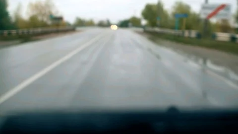 Driving with unfocused view on the road Stock Footage 71120998
