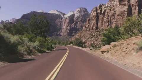 Driving USA: Beautiful point of view on road through Zion National Park, Utah Stock Footage 77444815