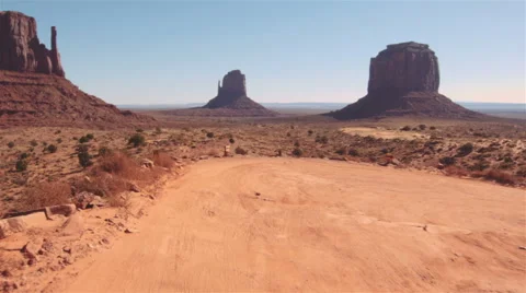 Driving USA: Car mount camera along rough road in Monument Valley Utah Arizona Stock Footage 57262676
