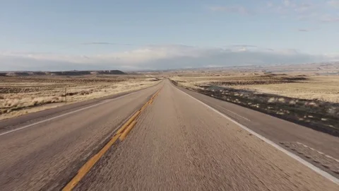 Driving USA: The open road – spectacular pov car shot speeding across desert Stock Footage
