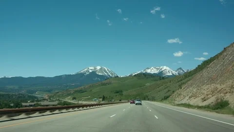 Driving with a view on a beautiful greenery on roadside hills  스톡 동영상 79851364