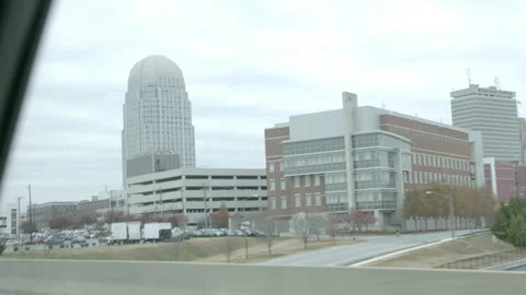 Driving View of Downtown Skyline and Skyscraper Stock Footage 343937240