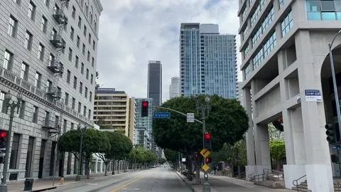 Driving view of empty downtown Los Angeles during corona virus lockdown Stock Footage 133826832