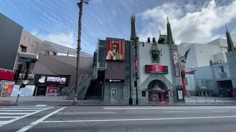 Driving view of an empty Hollywood Walk of Fame during corona virus quarantine Stock Footage 133826917