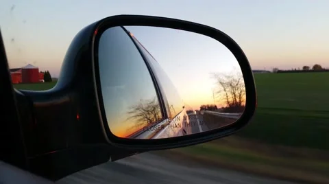 Driving View looking through side mirror Stock Footage 59991597