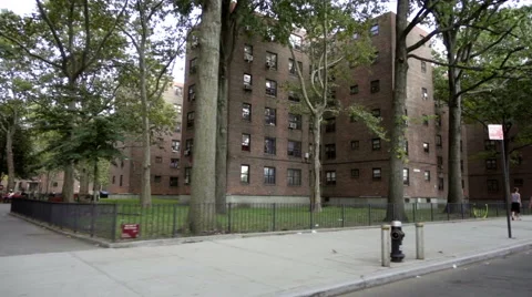 Driving view passing projects - public housing red brick buildings Brooklyn NYC 스톡 동영상 67251988