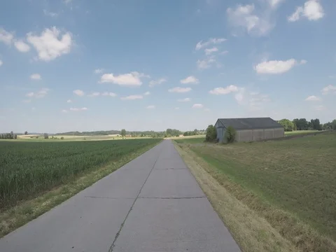 Driving to the village Stock Footage 83499930