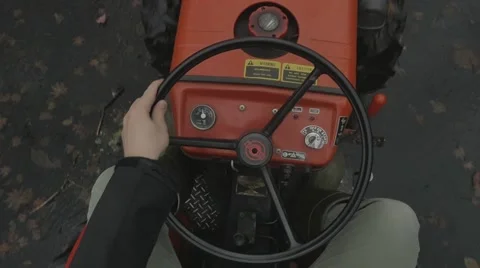 Driving a vintage tractor Video stock 44386907