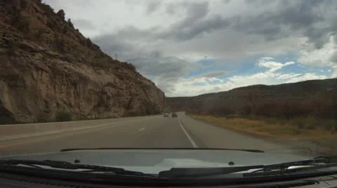 Driving west off the Rockies in Colorado - cliff sides - 8 Stock Footage
