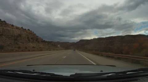 Driving west off the Rockies in Colorado - river start - 7 Stock Footage