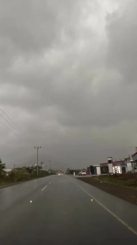 Driving on a Wet Asphalt Road During a Rainy Storm Stock Footage 342264960