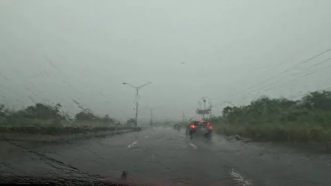 Driving on a wet highway during a heavy rainstorm Stock Footage 344977115