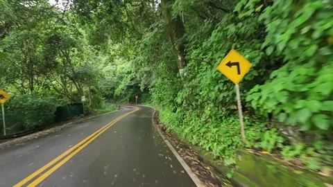 Driving Wet Mountain Road Through Rainy Jungle Stock Footage 341370087