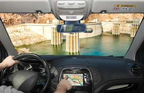 Driving while using navigation system towards Hoover Dam, Arizona, USA Stock-Fotos