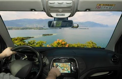 Driving while using navigation system towards Lake Garda, Italy Stock Photos