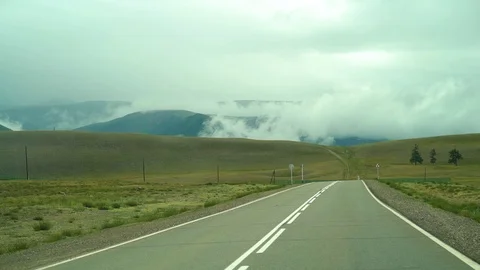 Driving on a winding mountain road Stock Footage 93199752