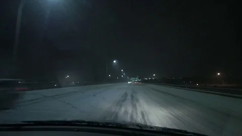 Driving in a Winter Blizzard Snow Storm. Stock Footage 74366865